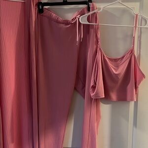 It’s a set with three pieces. Pants shirt and cover up